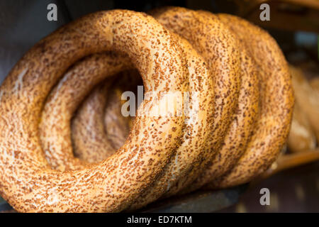 Traditional bread simit Turkish sesame seed bread rings in food market in Kadikoy district on Asian side of Istanbul,  Turkey Stock Photo