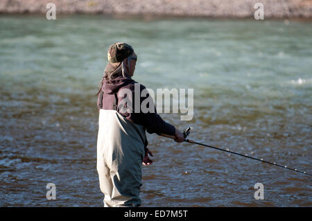 Man Fishing on Kasilof river on Kenai Peninsula in Alaska Stock Photo