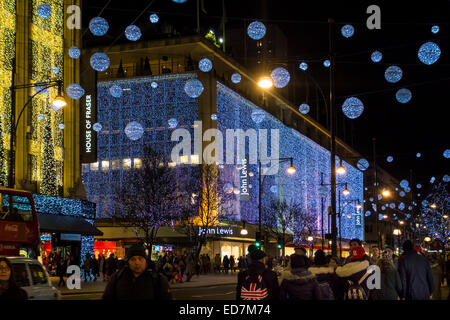 Shoppers in Oxford Street, Christmas Eve. Stock Photo