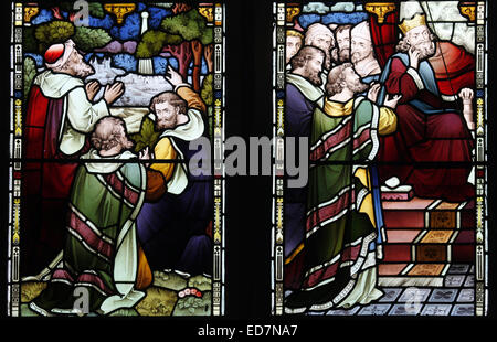 Stained glass window by Heaton, Butler & Bayne depicting the wise men following the star to Bethlehem and before King Herod Barnack church Stock Photo