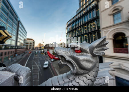 Dragon on Holborn Viaduct in the City of London with Goldman Sachs