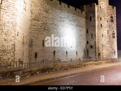 Caernarfon Castle at night Stock Photo