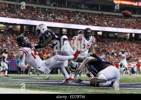 TCU linebacker Paul Dawson (47) hits Mississippi quarterback Bo Wallace ...