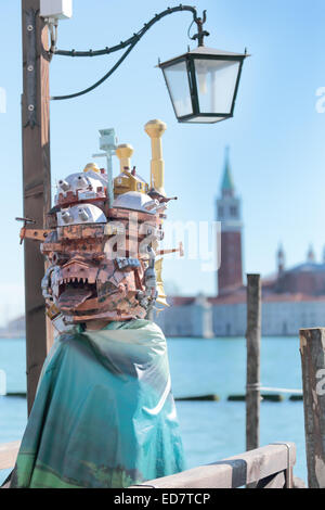 Odd mask with buildings exhibited during the traditional Carnival of Venice, Italy (2014 edition) Stock Photo