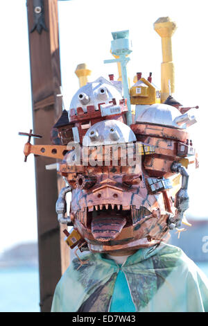 Odd mask with buildings exhibited during the traditional Carnival of Venice, Italy (2014 edition) Stock Photo