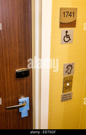 Chicago Illinois,River North,downtown,Illinois Street,Fairfield Inn & Suites,hotel,guest room,door,handicap symbol,do not disturb,tag,IL140906003 Stock Photo