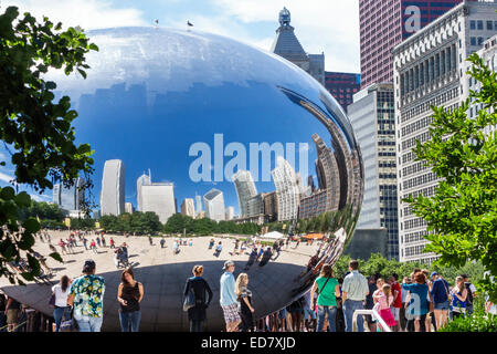 Chicago Illinois,Loop,Millennium Park,Cloud Gate,The Bean,artist Anish Kapoor,public art,reflected,reflection,distorted,city skyline,IL140906051 Stock Photo