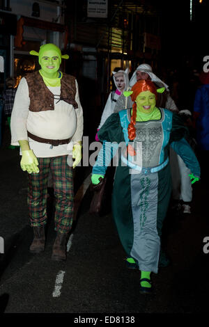 New Years Eve at St. Ives in Cornwall,UK on 31st December, 2014. Every year the whole town and many visitors dress up in fancy dress and a samba band leads a procession through the town finishing with fireworks.  Roger Askew /Alamy Live News Stock Photo