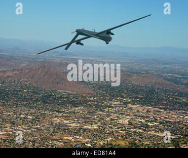 Unmanned military drone on patrol air to air Stock Photo