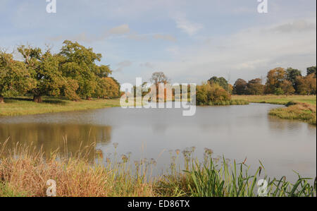 View across lake at Charlecote Park, Warwickshire, England, UK Stock Photo