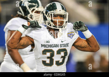 Michigan State running back Jeremy Langford (33) runs against Maryland ...