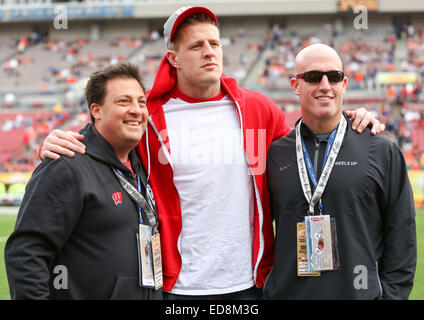 Wisconsin defensive tackle J.J. Watt #99 looks on during the game between  the Wisconsin Badgers and the Hawaii Warriors being played at Aloha Stadium  in Honolulu, Hawaii. The Wisconsin Badgers defeated the