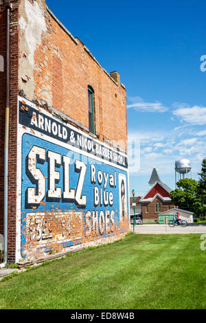 Illinois Chenoa,historic highway Route 66,US 66,highway,Selz Royal Blue Shoes Mural,outdoor ad,advertising,building,exterior,red brick,water tower,IL1 Stock Photo