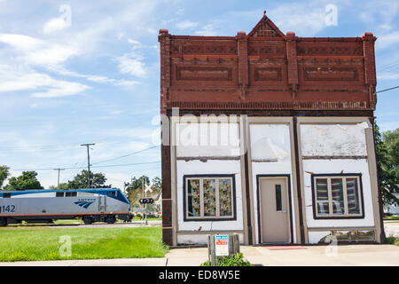 Illinois Chenoa,historic highway Route 66,US 66,highway,building,exterior,red brick,train,Amtrak,railroad,IL140909019 Stock Photo