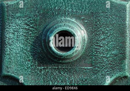 Green concrete reinforcement Garden fountain and tap. Stock Photo