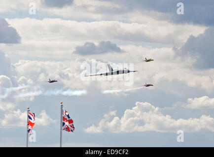 British Avro Vulcan escorted by three Folland Gnat jets at Wings & Wheels 2014 Stock Photo