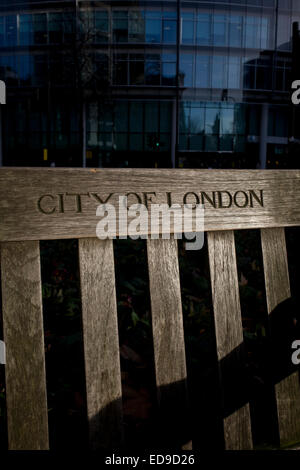 City of London bench and modern city background. Stock Photo