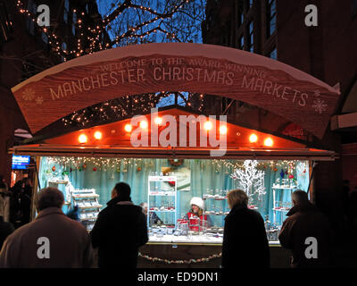 Welcome to Manchester city Xmas German markets Nov/Dec, England, UK at dusk Stock Photo