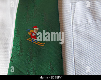 Interesting vintage tie, male neckware in silk, Santa skiing Stock Photo