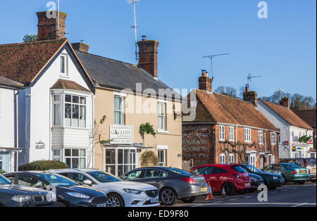 Typical UK heritage real estate property; view of cottages, shops and an art gallery in the High Street in Stockbridge, Hampshire, southern England Stock Photo