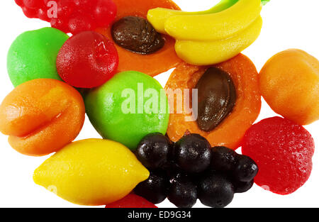 colored jelly candies in the shape of fruits banana pear grapes peach apricot lemon Stock Photo