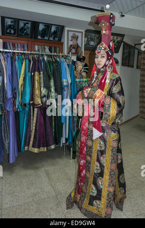 Woman in Mongolian queen attire on the steppes, near Ulaan Baatar ...