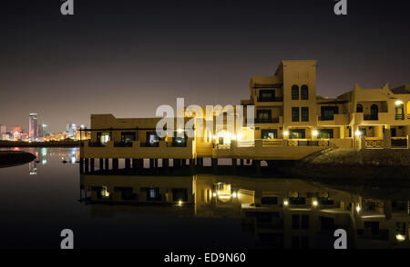 Manama, Bahrain - November 22, 2014: Novotel Al Dana Resort Bahrain. Night view of Manama, the Capital city of Bahrain, Middle E Stock Photo