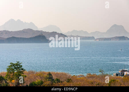 View of Komodo island's coastline and the surrounding islets in East Nusa Tenggara, Indonesia. Stock Photo