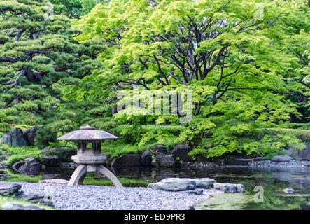 traditional japanese stone lantern in a park of Tokyo Stock Photo