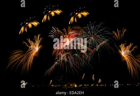 Amazing magic colorful fireworks in dark background Stock Photo