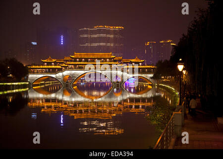Illuminated Anshun Bridge over the the Jin River at night in the provincial capital of Chengdu in Sichuan, China Stock Photo