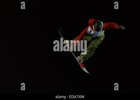 ISTANBUL, TURKEY - DECEMBER 20, 2014: Ryan Stassel jump in FIS Snowboard World Cup Big Air. This is first Big Air event for both Stock Photo