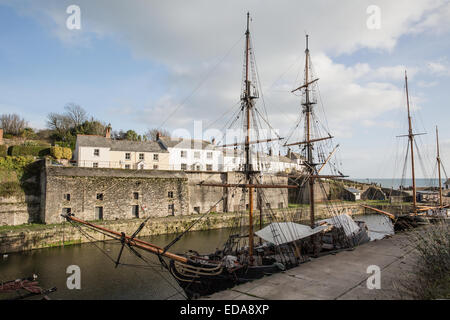 Tall ships resting in the harbour at Charlestown, Cornwall. Stock Photo