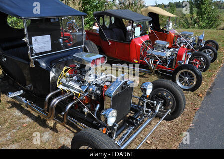 Three T Bucket custom built cars at a car show. Stock Photo