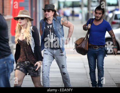 Richie Sambora and Orianthi arrive for their concert at the Ulster Hall  Featuring: Orianthi Panagaris,Richie Sambora Where: Belfast N Ireland, United Kingdom When: 01 Jul 2014 Stock Photo