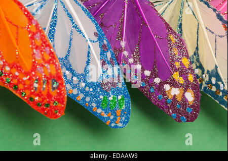 Bird feathers decorated with colorful patterns Stock Photo