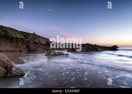 Night falls over Sharrow Point on Whitsand Bay in Cornwall Stock Photo