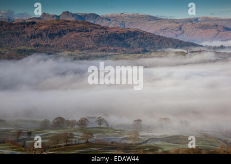 Low mist above the village of Outgate, near Hawkshead, as seen from the summit of Latterbarrow, lake district, Cumbria