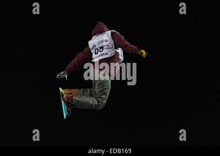 ISTANBUL, TURKEY - DECEMBER 20, 2014: Elena Koenz jump in FIS Snowboard World Cup Big Air. This is first Big Air event for both, Stock Photo