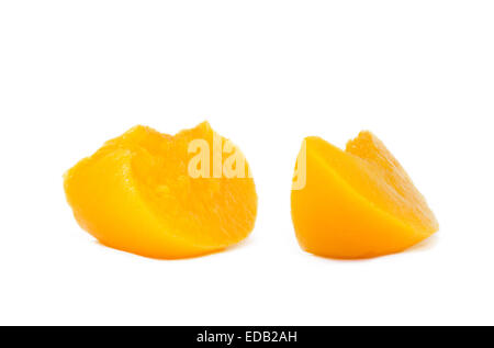 Two slices of peach on a plain white background Stock Photo