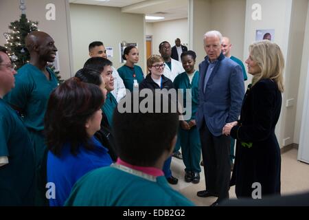 US Vice President Joe Biden and Dr. Jill Biden thank nurses and doctors during a Christmas Day visit to Walter Reed National Military Medical Center December 25, 2014 in Bethesda, Maryland. Stock Photo
