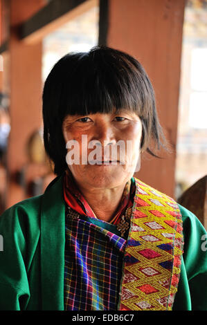 Local lady wearing traditional dress, Trongsa Dzong, Bhutan Stock Photo