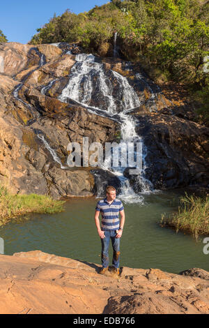 SWAZILAND, AFRICA - Young man, tourist, at Phophonyane Nature Reserve, during hike. MR Stock Photo