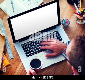 Man Using Laptop in the Office Stock Photo