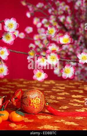 chinese new year decorations on cherry blossom tree Stock Photo