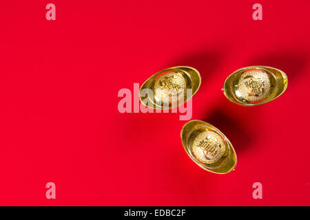 Chinese new year and gold ingots with copyspace for design purpose Stock Photo