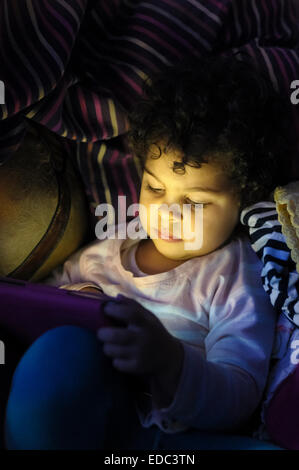 Toddler Using an Ipad at Home Stock Photo