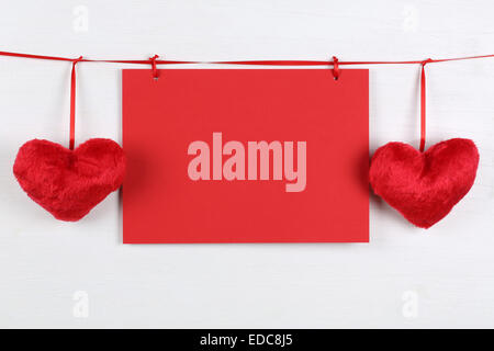 Blank greeting card on birthday, Valentine's or mother's day with copyspace and two hearts Stock Photo