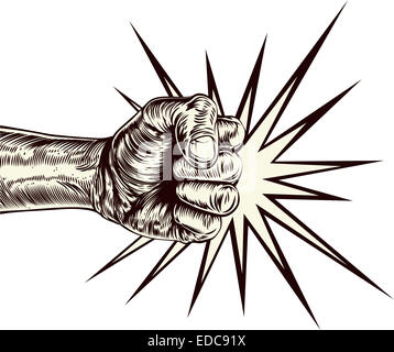 An original illustration of a fist punching in a vintage wood cut style Stock Photo