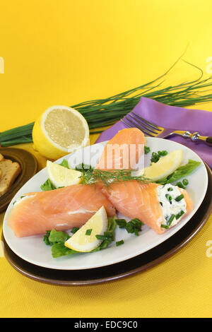 Salmon rolls with cream cheese and chives Stock Photo